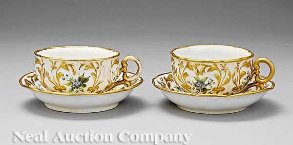 Appraisal: A Pair of Continental Polychrome and Gilt-Decorated Porcelain Footed Teacups