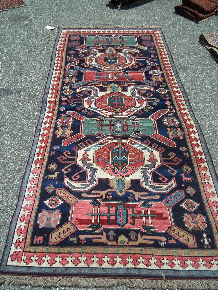 Appraisal: ANTIQUE CAUCASIAN SCATTER RUG Colorful old Caucasian scatter rug ft