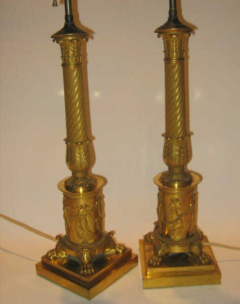 Appraisal: PAIR OF EMPIRE GILT METAL TABLE LAMPS Columnar form incorporating