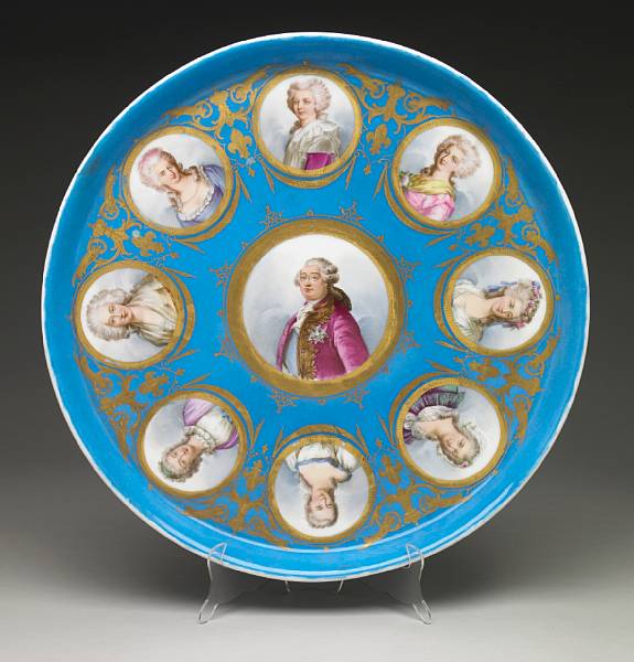 Appraisal: A large Louis XVI style porcelain charger Centered by a