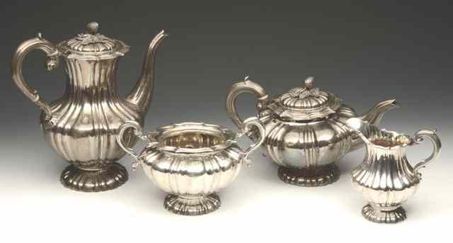 Appraisal: A SILVER FOUR PIECE TEA AND COFFEE SET with fluted