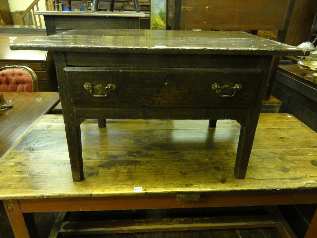 Appraisal: An antique low oak side centre table with overhanging rectangular