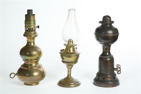 Appraisal: THREE BRASS OIL LAMPS Two are moderator lamps h And