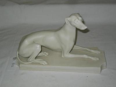 Appraisal: A COPELAND PARIAN FIGURE modelled as a recumbent greyhound on