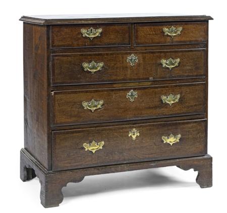 Appraisal: A George III oak and mahogany banded chest the moulded