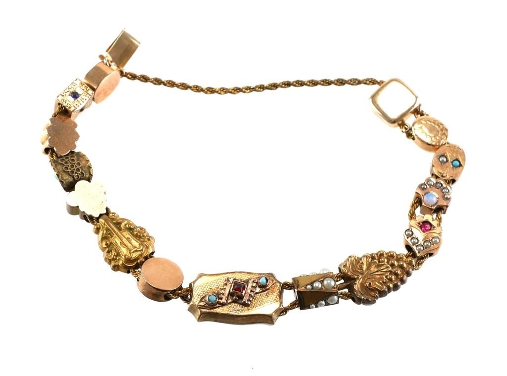 Appraisal: Victorian gold filled slide charm bracelet with colored stones and