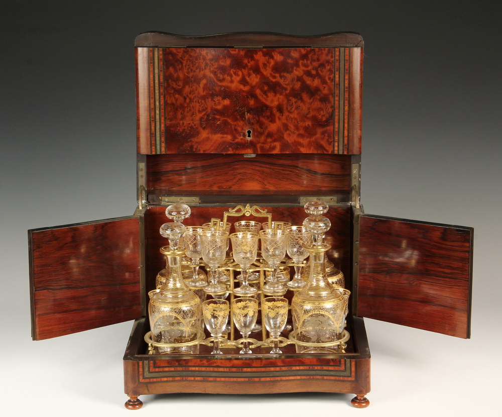 Appraisal: FRENCH PC GILT GLASS TANTALUS SET IN SERPENTINE CASE -