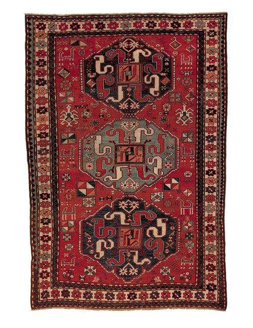 Appraisal: Cloudband Kazak throw rug ca with three medallions on a