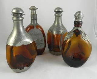 Appraisal: Wine Wine- pewter mounted amber glass decanters with stopper marked