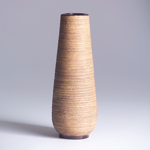 Appraisal: UPSALA-EKEBY Tapering ceramic vase with yellow and brown spun finish