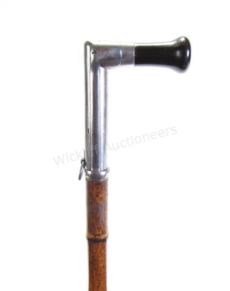 Appraisal: Belgian Bamboo Shaft Gun Cane bamboo and metal shaft metal