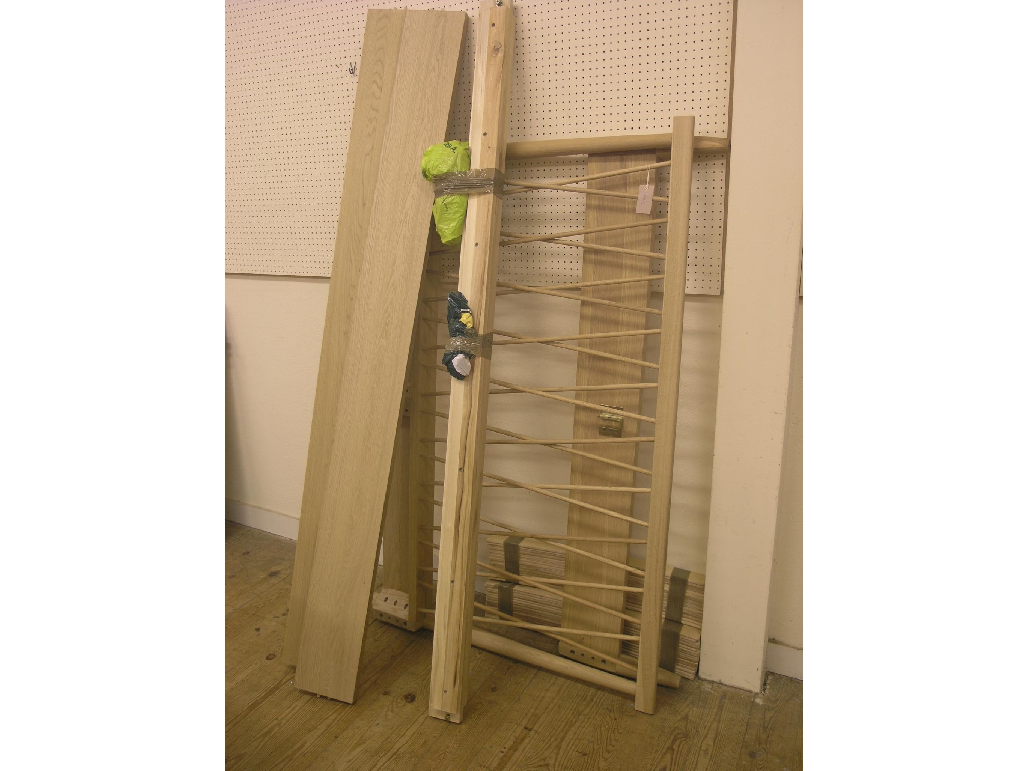 Appraisal: A light oak double-size bedstead stick-back headboard ft in -