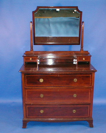 Appraisal: An Edwardian string inlaid mahogany dressing chest with mirror