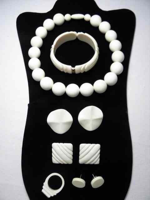 Appraisal: Carved ivory jewelry nine pieces including a hinged bangle bracelet