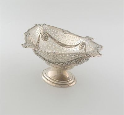 Appraisal: A late Victorian boat shaped dish on an oval pedestal