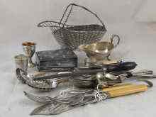 Appraisal: A quantity of silver plate including a woven bottle carrier