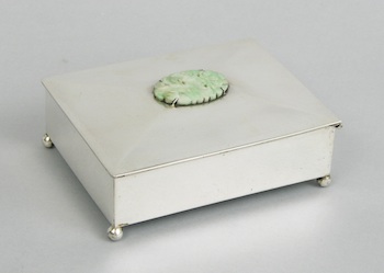 Appraisal: A Chinese Silver Box with a Carved Jadeite Ornament A