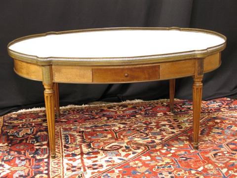 Appraisal: LOUIS XVI STYLE MAHOGANY COFFEE TABLE th century the white