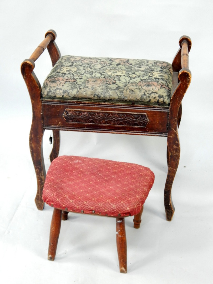 Appraisal: A mahogany piano stool with hinged music locker seat and