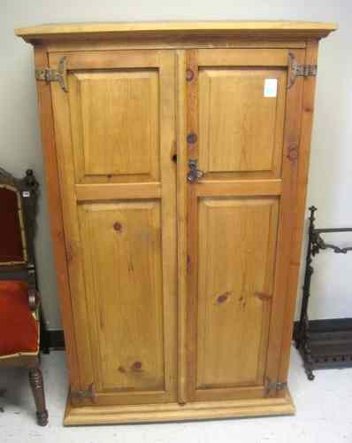 Appraisal: ANTIQUE STYLE PETITE PINE WARDROBE rustic high western design having