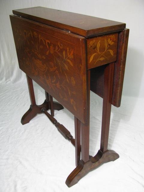 Appraisal: Early th century petite marquetry inlay drop leaf table Condition