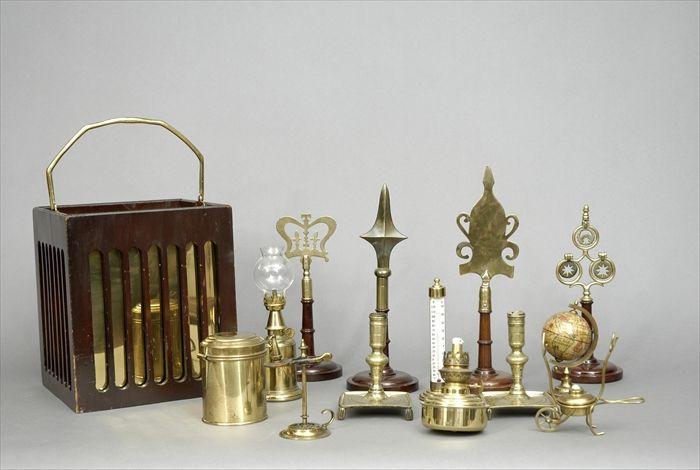 Appraisal: Fourteen Brass Articles Including a pair of candlesticks a Pig