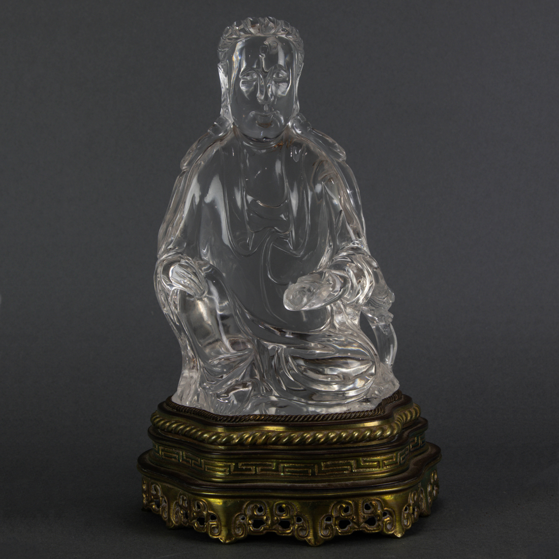 Appraisal: ROCK CRYSTAL FIGURE OF GUANYIN Rock crystal figure of Guanyin