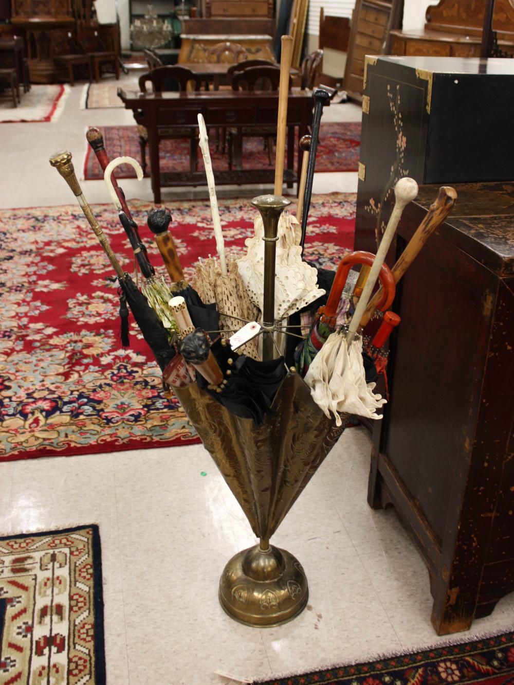 Appraisal: VINTAGE UMBRELLA COLLECTION IN BRASS UMBRELLA-FORM FLOOR STAND umbrella parasols