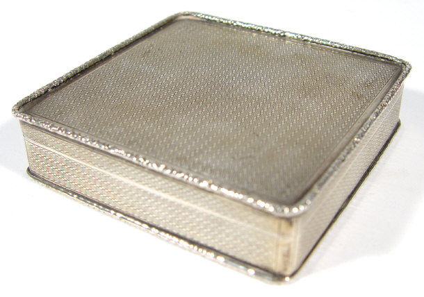 Appraisal: Square silver box with hinged lid and engine turned decoration