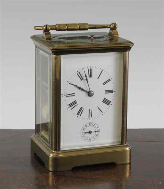 Appraisal: An Edwardian quarter repeating lacquered brass carriage alarm clock with