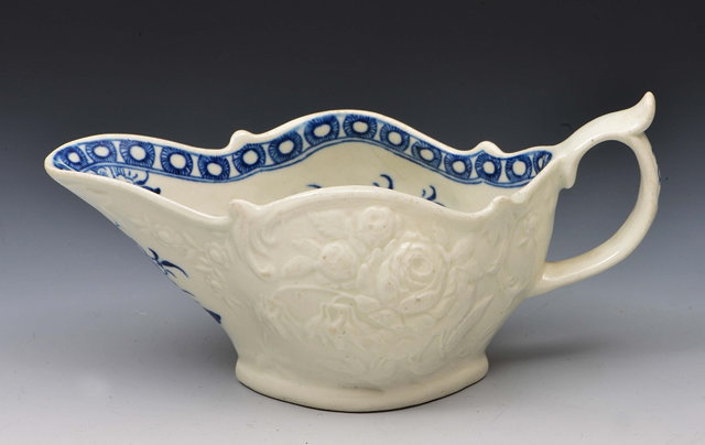 Appraisal: Worcester blue and white sauce boatcirca - decorated underglaze peony