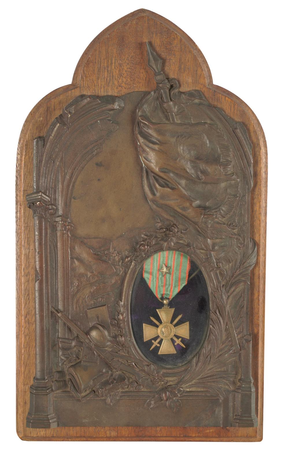 Appraisal: FRENCH MILITARY MEDALmounted under glass within a bronze plaque applied