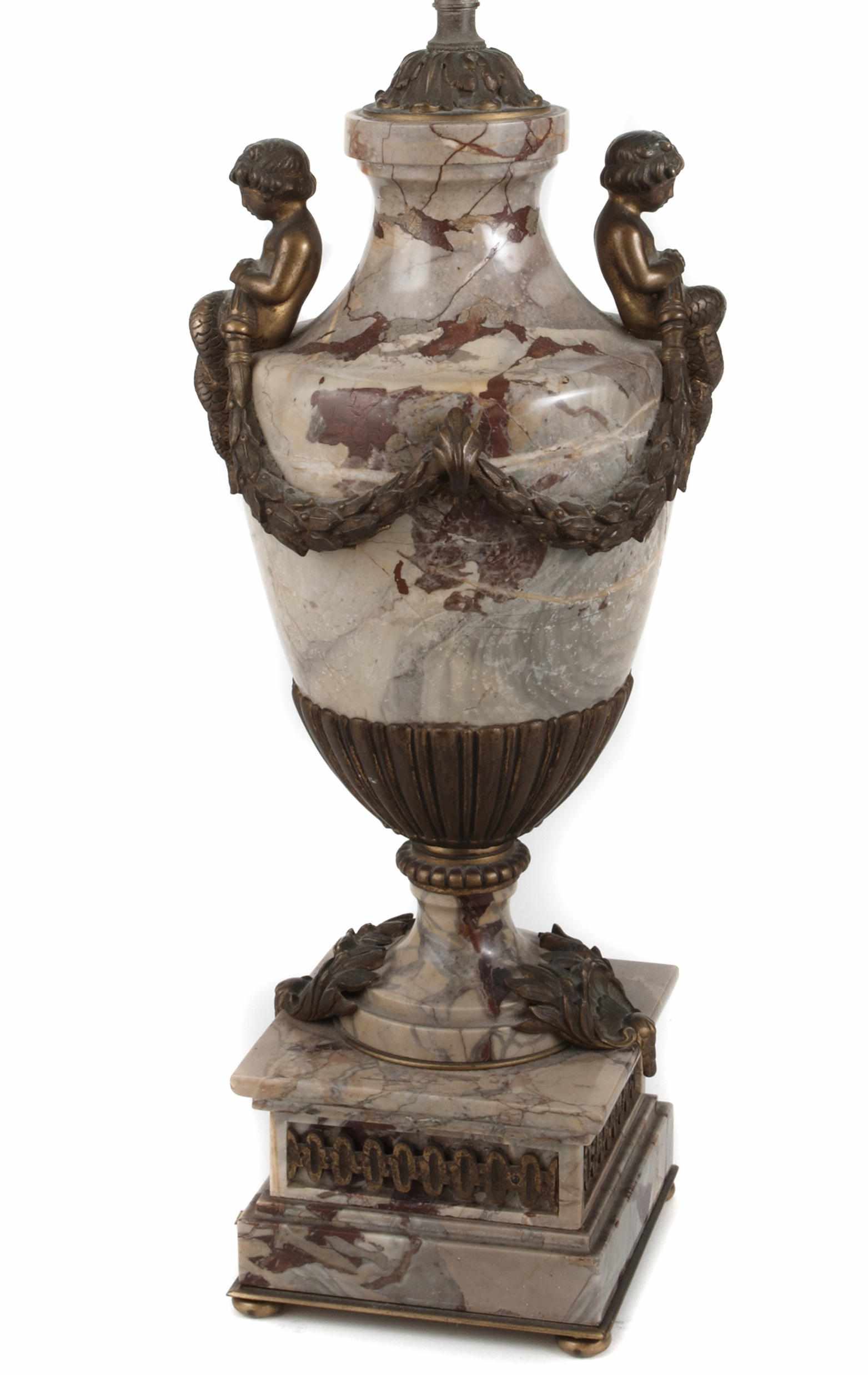 Appraisal: A Louis XVI style gilt bronze mounted marble urn now