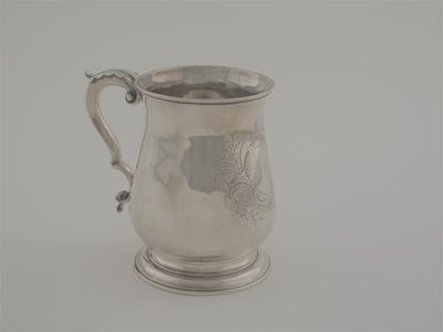 Appraisal: An early George III mug with a leaf-capped scroll handle