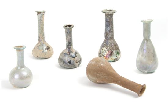 Appraisal: A Collection of Six Roman Glass Flasks Height of tallest