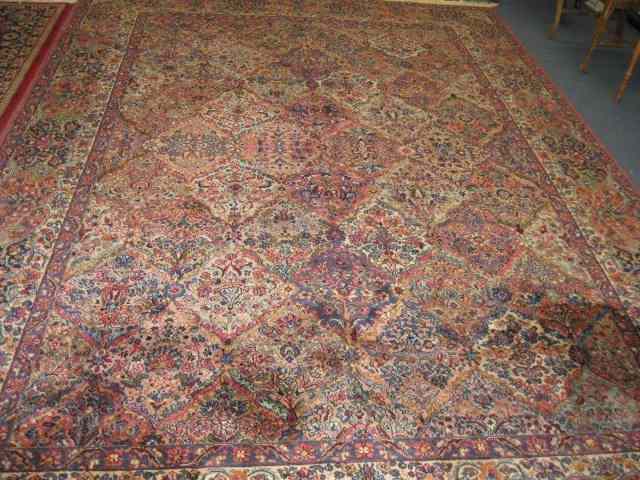 Appraisal: Karastan Grand Kerman Room Size Rug elaborate overall florals light