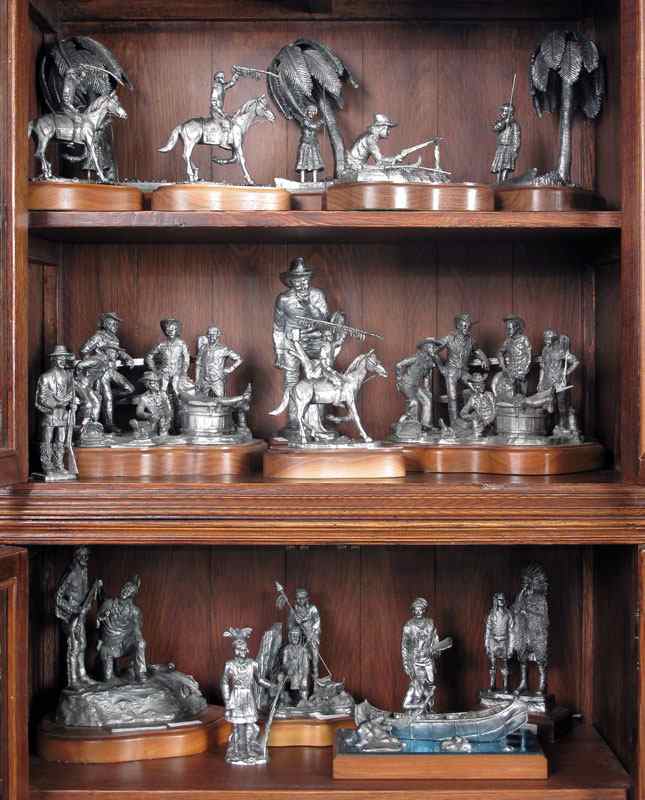 Appraisal: MICHAEL RICKER PEWTER COWBOYS INDIANS FIGURINES Approx pieces to include