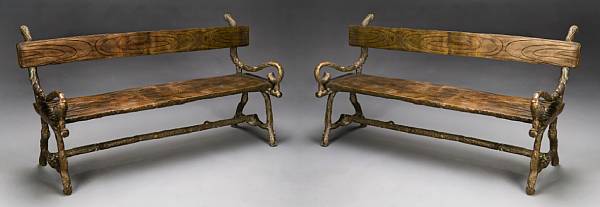 Appraisal: A pair of patinated bronze rusticated garden benches Each with