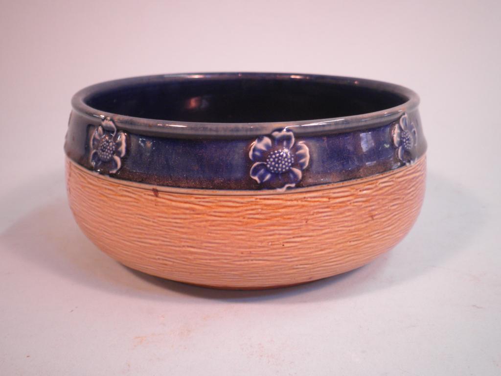 Appraisal: A Royal Doulton stoneware bowl decorated with a blue band