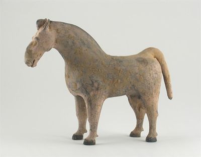 Appraisal: A Chinese pottery model of a horse leaning forward standing