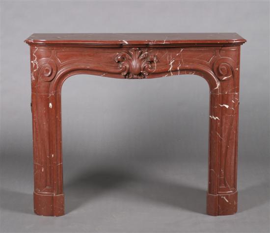 Appraisal: A Louis XV Style Rouge Marble Mantlepiece Length inches