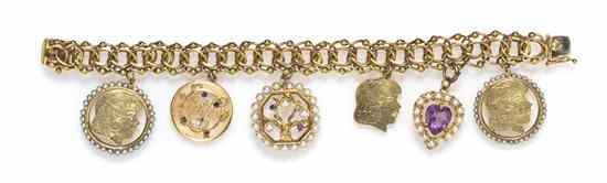 Appraisal: A Karat Yellow Gold Charm Bracelet with Six Attached Karat