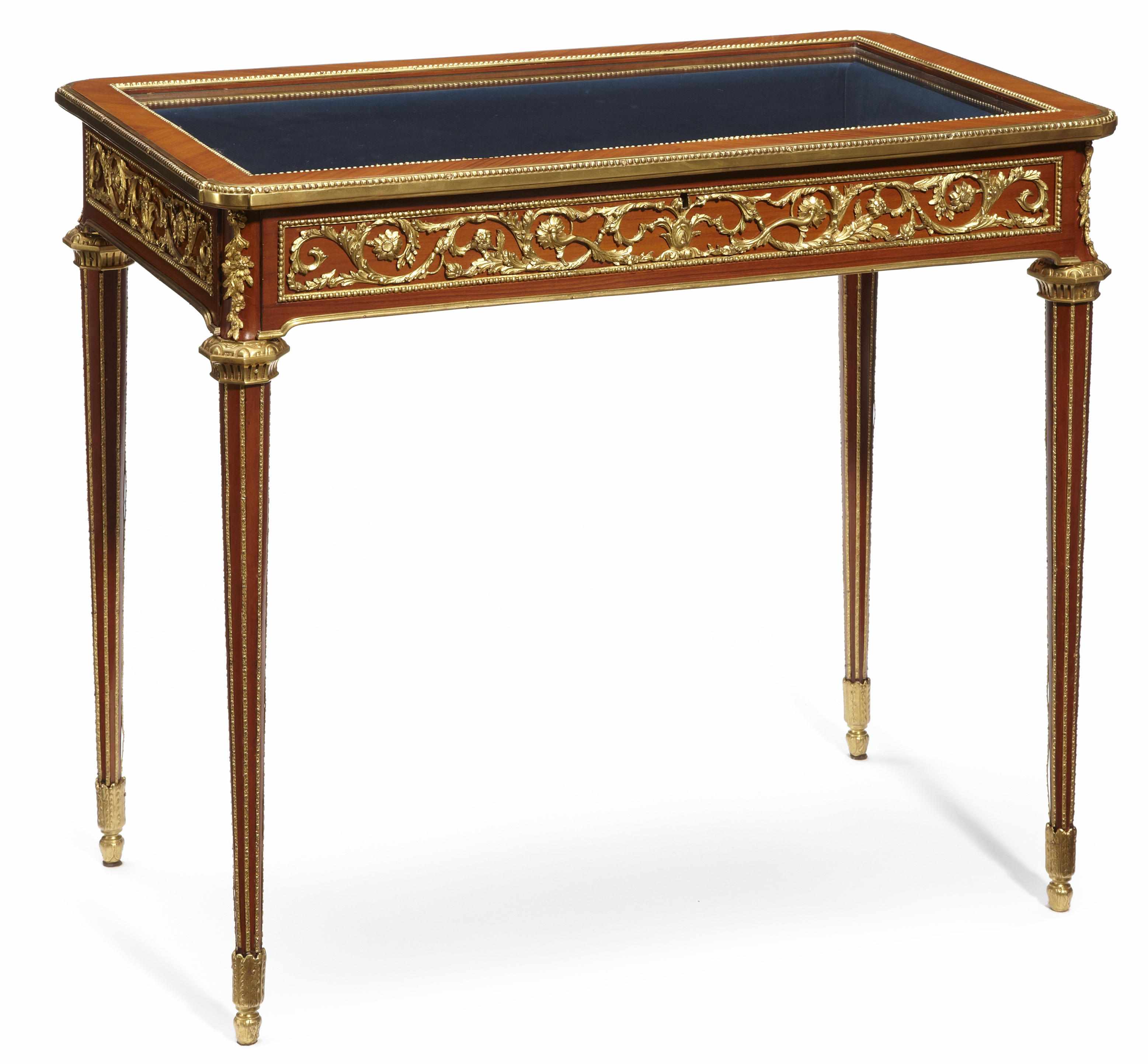 Appraisal: A Louis XVI style gilt bronze mounted walnut bijouterie table