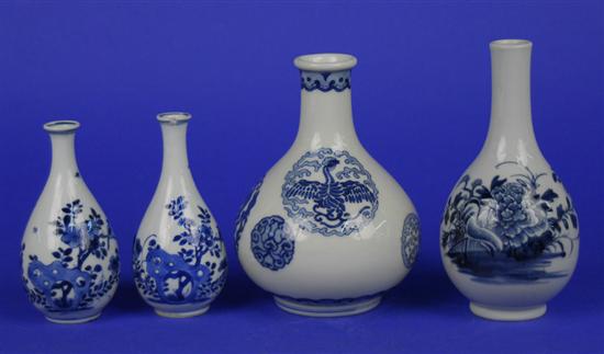 Appraisal: FOUR CHINESE BLUE AND WHITE BOTTLE FORM VASES two Kangxi