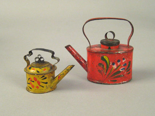 Appraisal: Two miniature toleware kettles th c retaining their original red