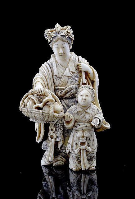 Appraisal: A Japanese ivory okimonoMeiji period - modelled as a standing