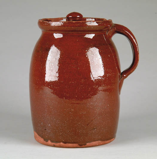 Appraisal: EARLY TH CENTURY GLAZED REDWARE COVERED HANDLED JAR New England