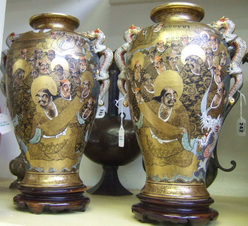 Appraisal: A pair of Japanese satsuma earthenware vases Meiji Taisho period