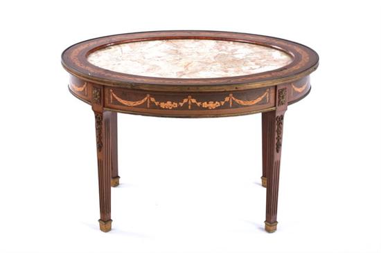 Appraisal: LOUIS XVI STYLE MARBLE-TOP OVAL LOW TABLE th century Recessed