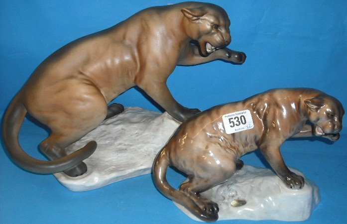 Appraisal: Beswick large Puma on Rock matt seconds and Small Puma